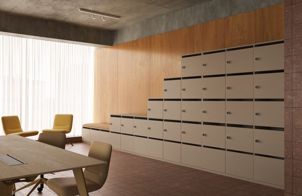 Layer Dolap — Stepped, multi-compartment cabinet in light beige, standing in an office setting with wood paneling