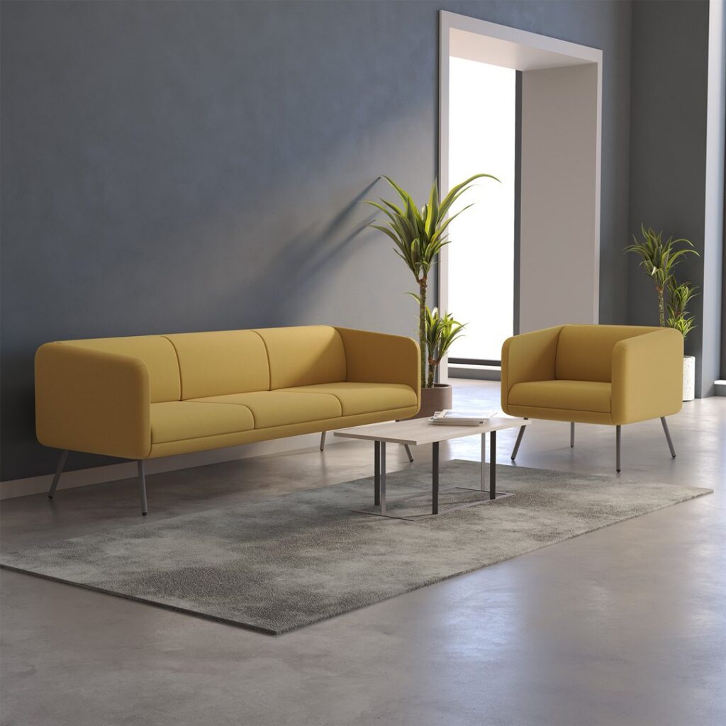 Set — Yellow fabric three-seater sofa and armchair with a wooden coffee table and plants in a modern office lobby