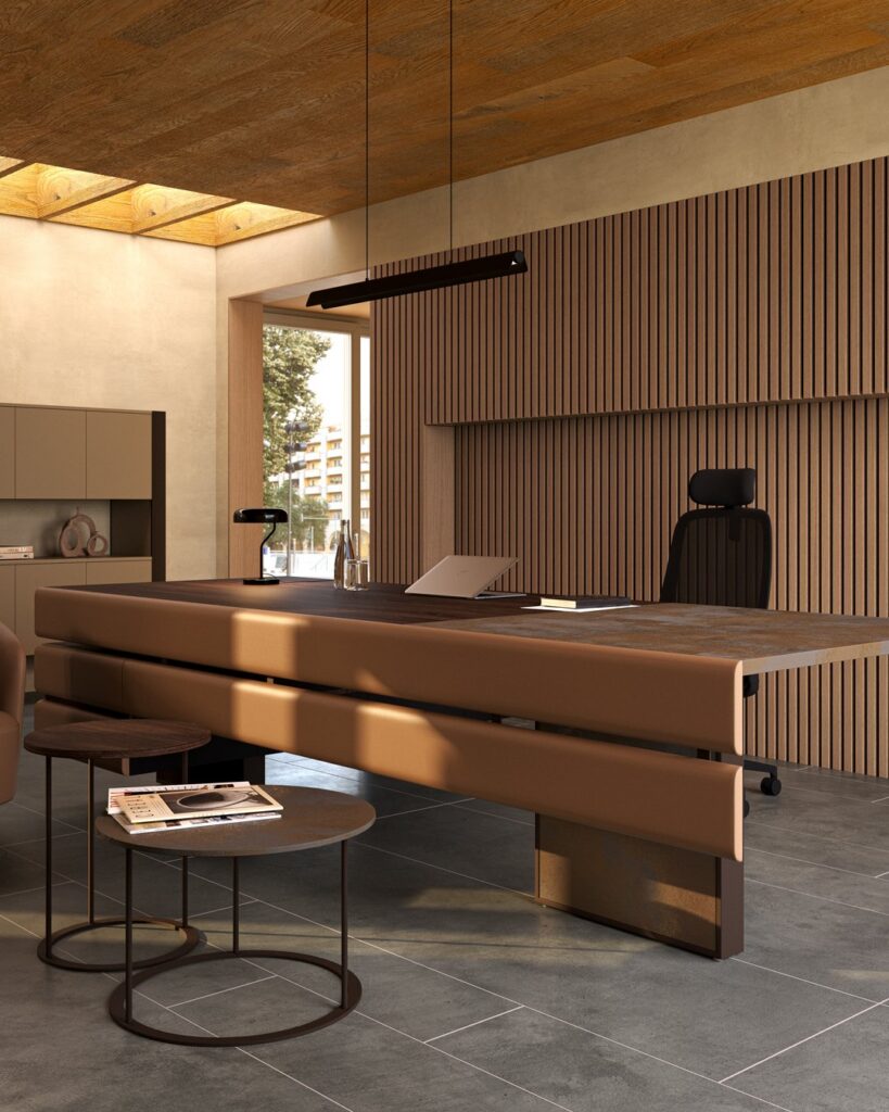 Plato — A modern executive desk with brown leather and wood details, with side tables in an office setting.