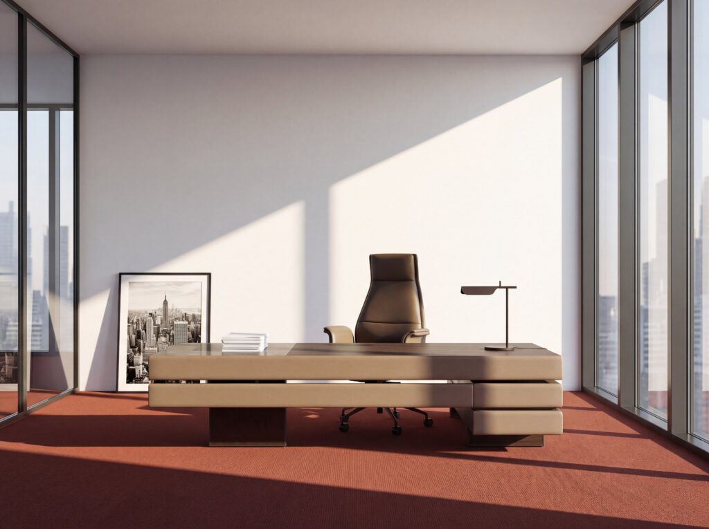 Plato — Brown leather and wood executive desk, brown leather office chair, and desk lamp in a modern office