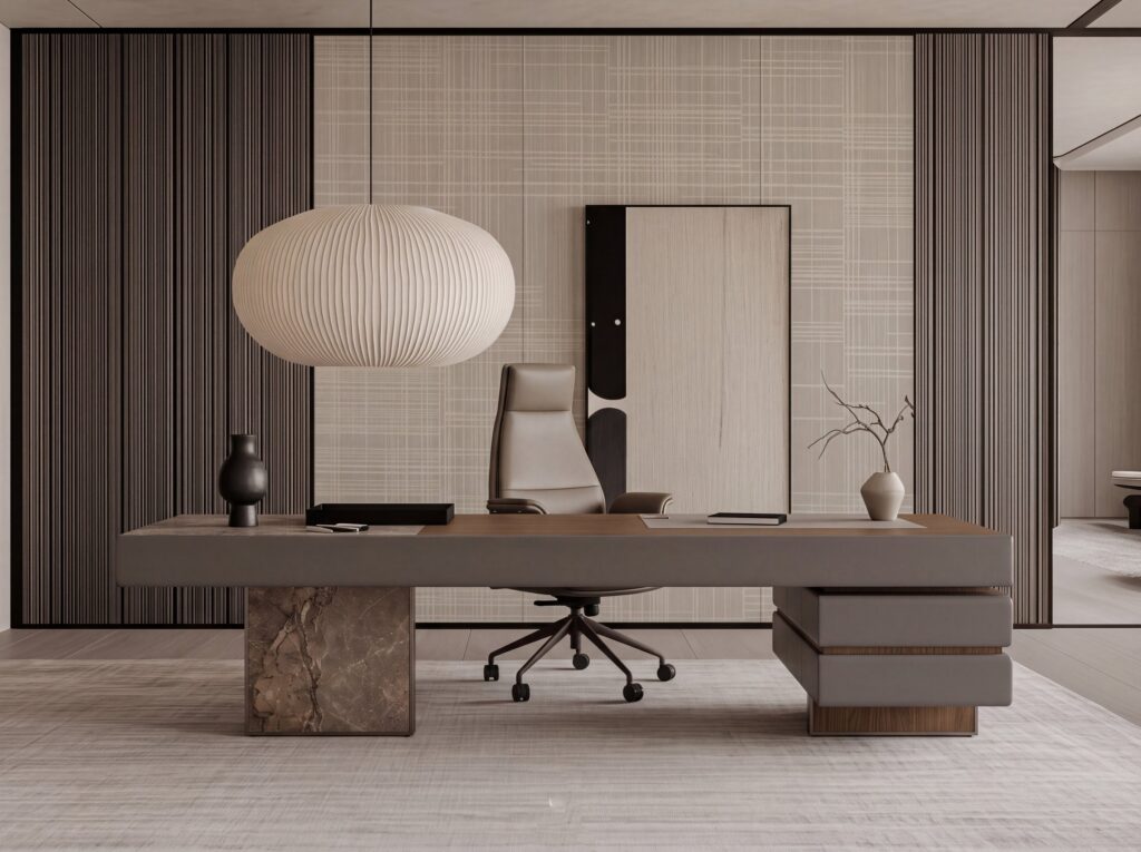 Plato — Gray and wood executive desk, leather office chair, pendant lamp, and decorative objects in a modern office setting